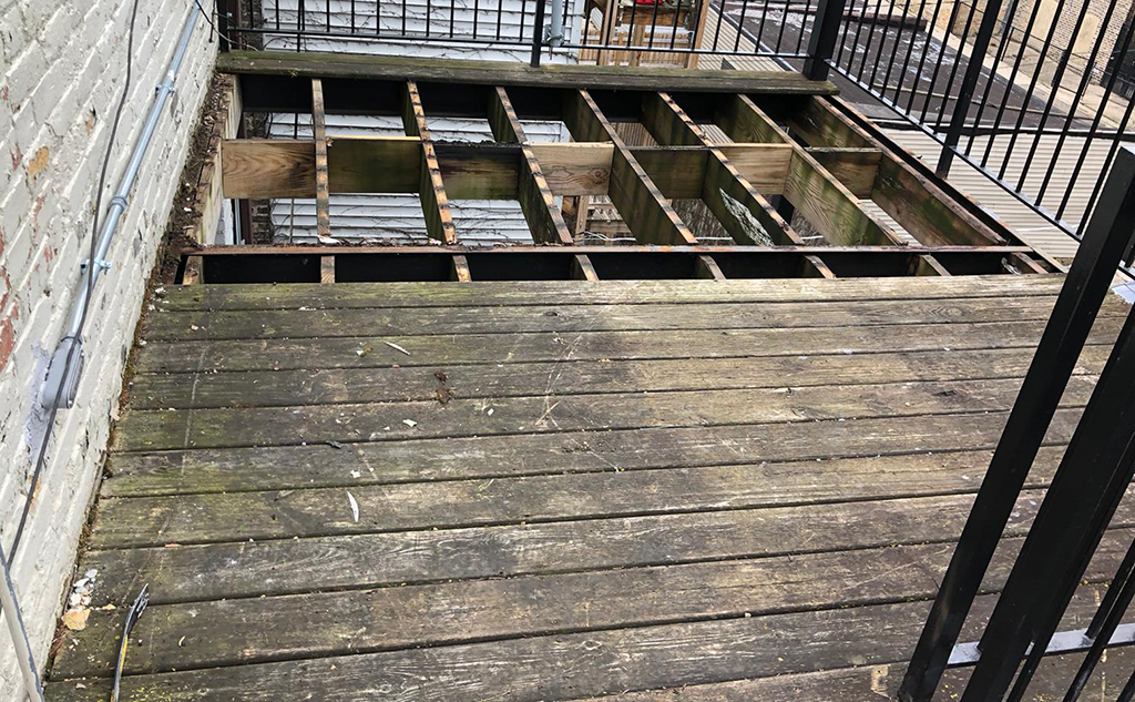 damaged wood deck, rotten boards