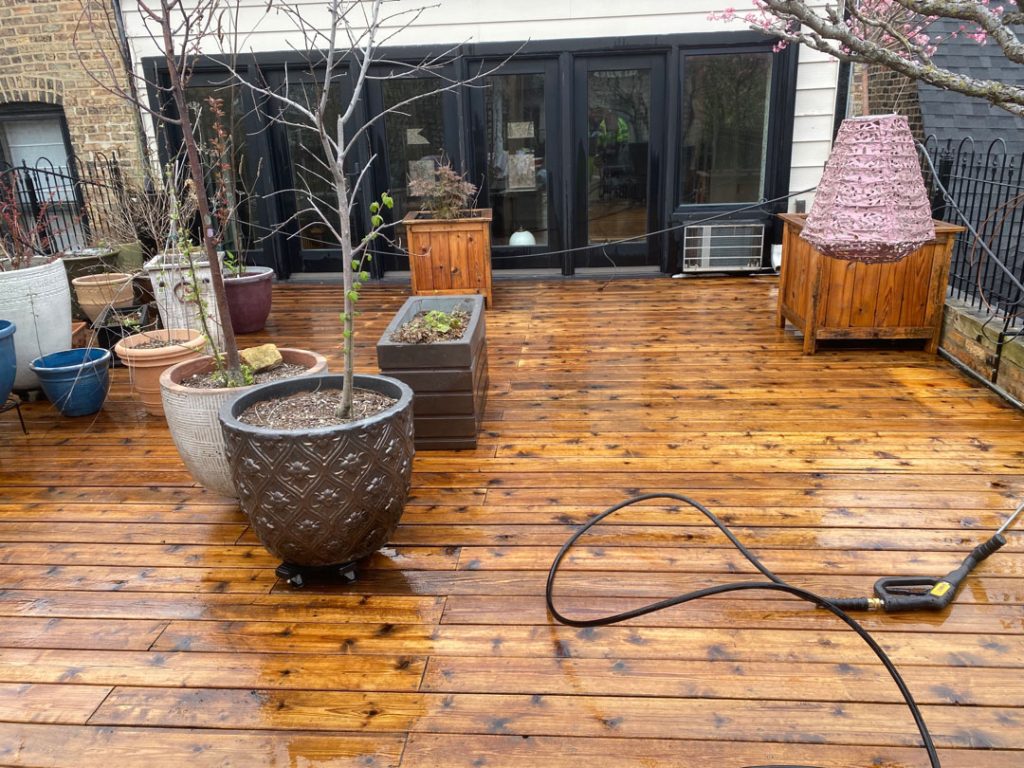 wooden deck is being prepared for sealing